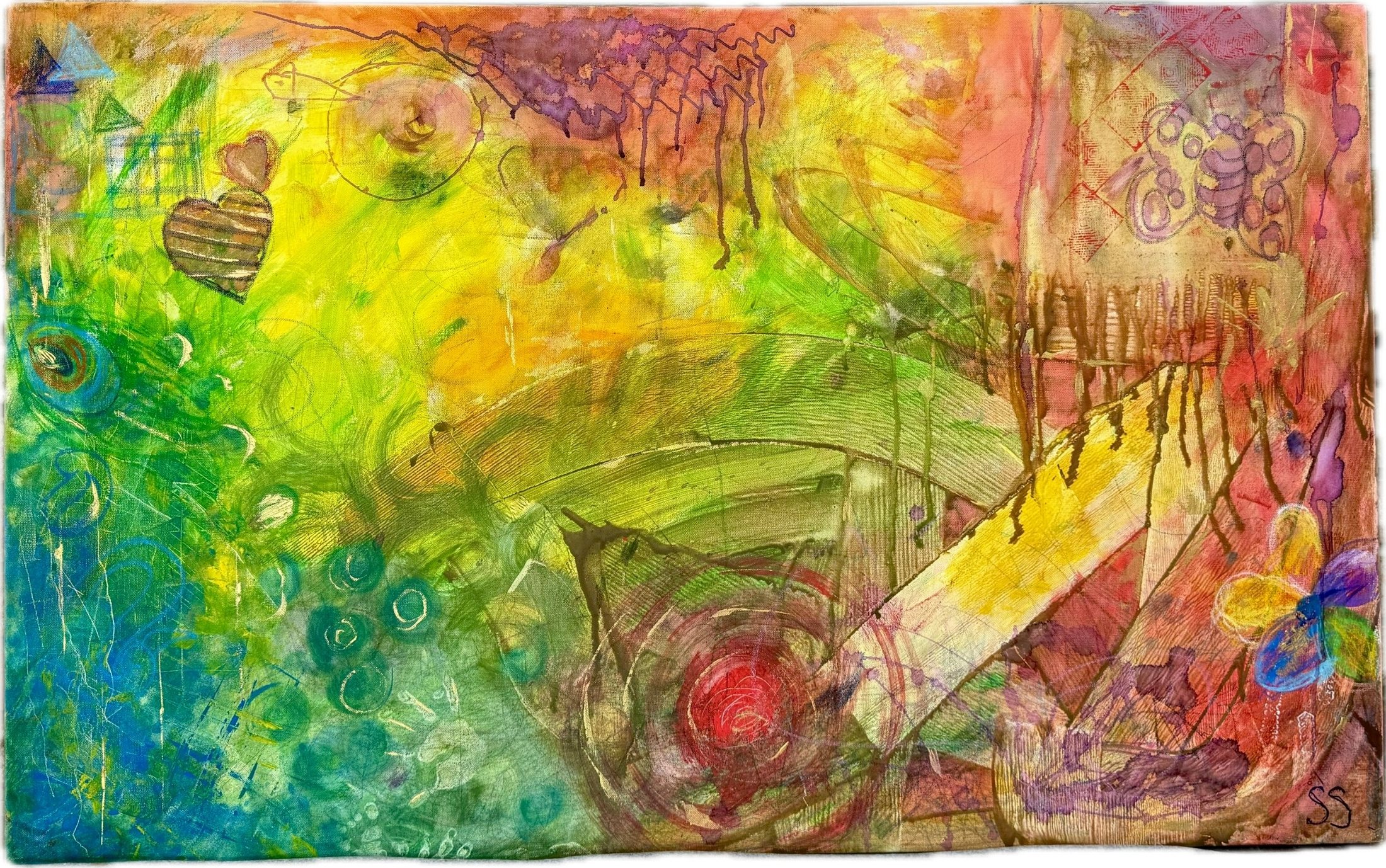 Large abstract painting moving from blue and green on the left to yellow, orange and pink on the right, with hearts, a butterfly, drips and a red spiral
