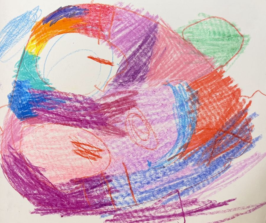 Crayon drawing of a looping pink and purple shape with a rainbow-colored ring and a green patch